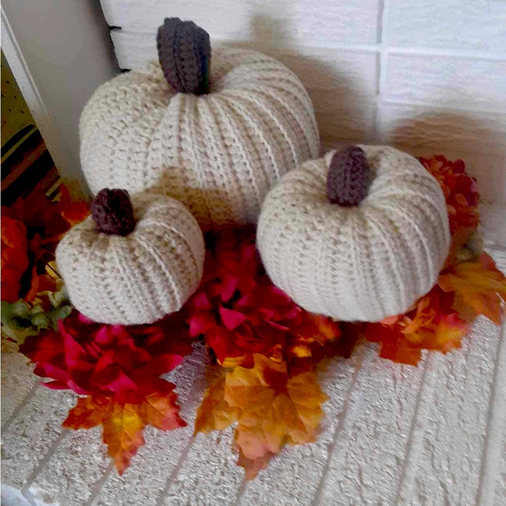 Adorable set of three crocheted pumpkins